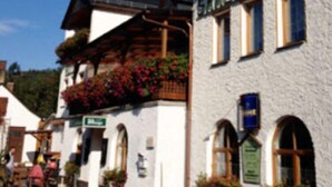 A traditional European building with a sign reading "STELLA STRAND". - Hotel Saalestrand (Unterwellenborn)