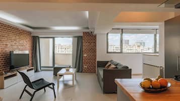Apartment, 2 Bedrooms | Living area | Flat-screen TV