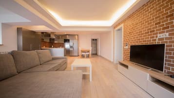 Apartment, 2 Bedrooms | Living area | Flat-screen TV