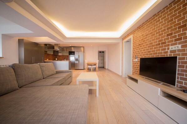 Apartment, 2 Bedrooms | Living area | Flat-screen TV