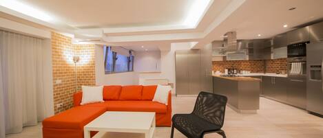 Apartment, 2 Bedrooms | Living room | Flat-screen TV