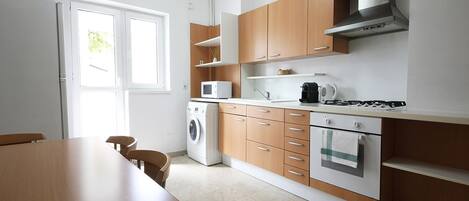Apartment, 1 Bedroom | Private kitchen | Full-sized fridge, microwave, oven, stovetop