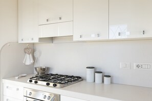 Fridge, oven, dishwasher, high chair
