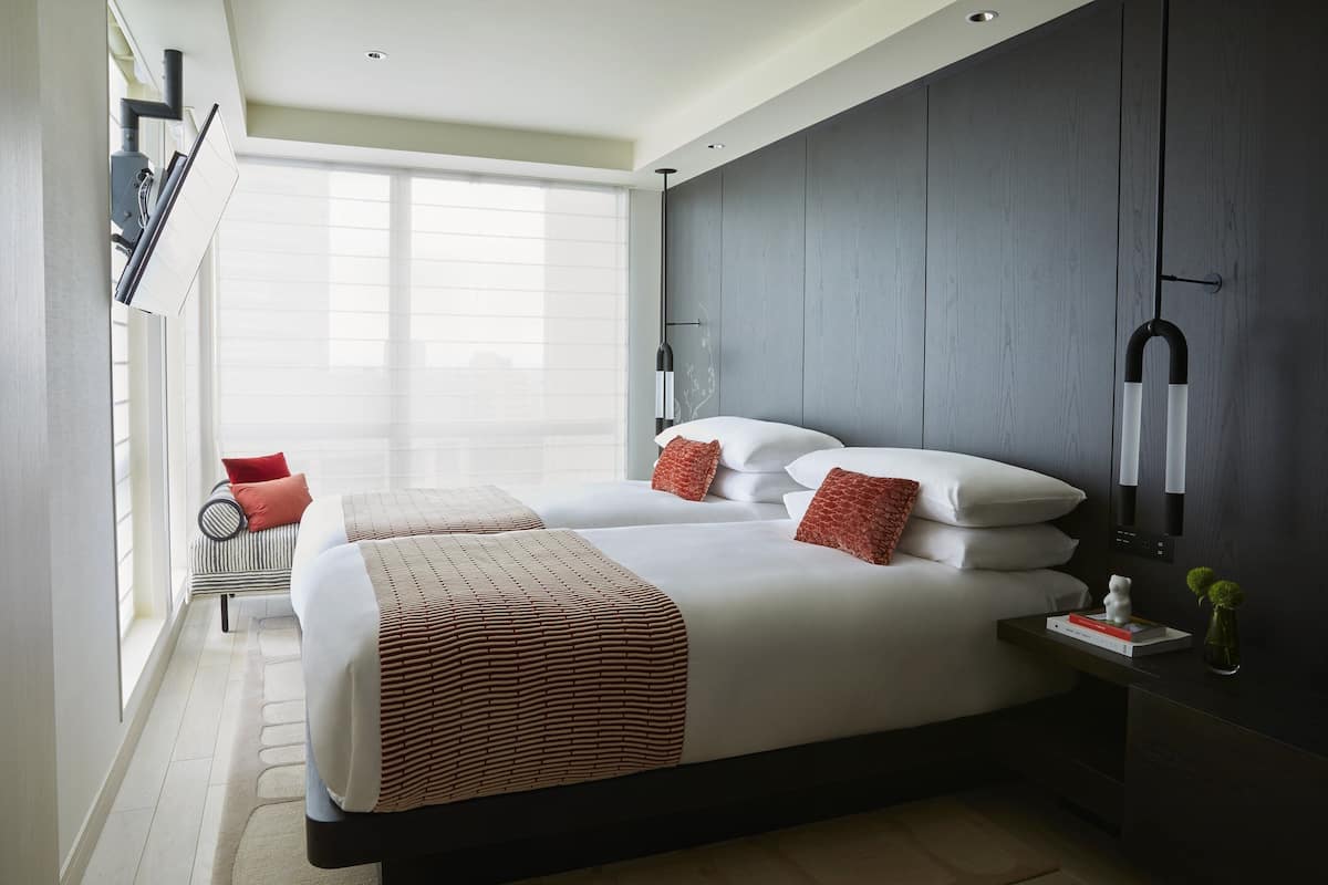 Premium bedding, down comforters, minibar, in-room safe