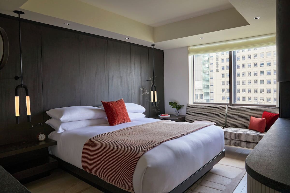 Premium bedding, down comforters, minibar, in-room safe