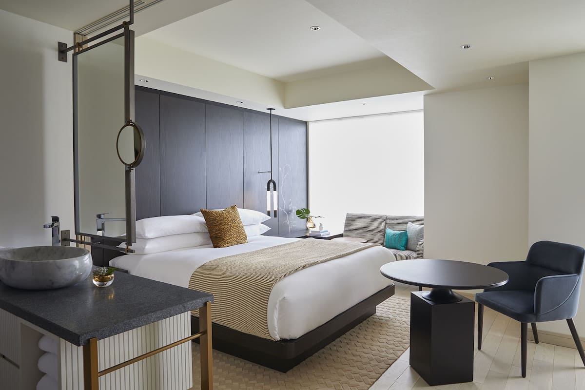 Premium bedding, down comforters, minibar, in-room safe