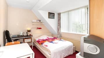 Blackout curtains, free WiFi, bed sheets