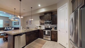 Townhome, 3 Bedrooms | Private kitchen | Fridge, oven, coffee/tea maker, toaster