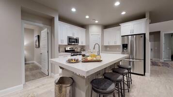 Townhome, 4 Bedrooms | Private kitchen | Fridge, microwave, oven, stovetop