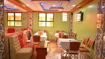 Breakfast, lunch, dinner served; local and international cuisine
