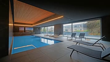 Indoor pool, open 6:00 AM to 10:00 PM, sun loungers