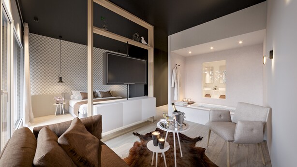 Ein modernes Wohnzimmer mit einer Couch, einem Couchtisch, einem Fernseher und einem Kamin.
