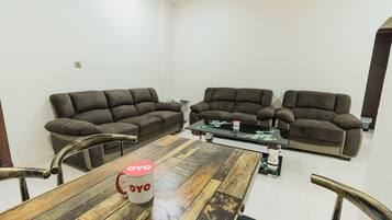 Standard Apartment, 1 Bedroom | Living room | Flat-screen TV