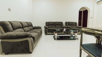 Standard Apartment, 1 Bedroom | Living room | Flat-screen TV
