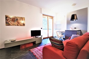 Appartement, 1 chambre | Coin séjour | Télévision à écran plat
