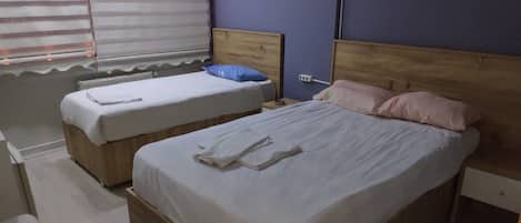 Family Room | 1 bedroom, minibar, blackout drapes, soundproofing