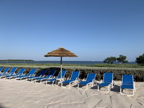 On the beach, sun-loungers, beach towels