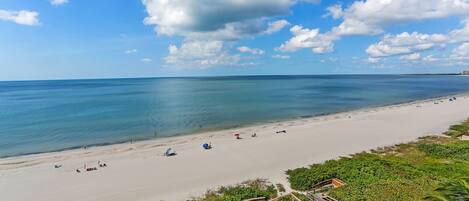On the beach, sun-loungers, beach towels