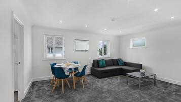 Apartment, 2 Bedrooms | Living area | 32-inch flat-screen TV with digital channels, TV, Netflix