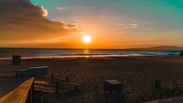 Beach nearby, white sand, sun loungers, beach umbrellas