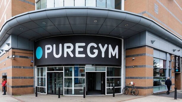 A PUREGYM gym with a modern entrance and glass doors. - Birmingham Garnet, 3 Bedroom Apartment (Birmingham)