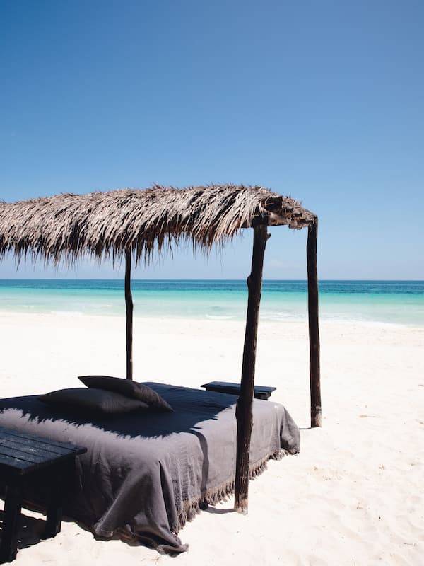 On the beach, sun loungers, beach towels
