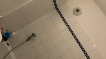 Economy Room | Bathroom amenities | Combined shower/bathtub, free toiletries, hair dryer, towels