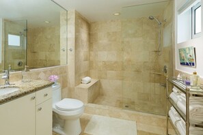 Shower, hair dryer, towels, soap