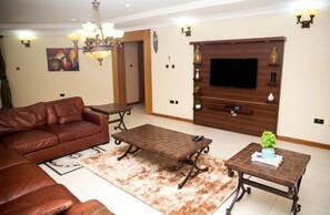 Flat-screen TV - Kentucky Homes International (Lekki)