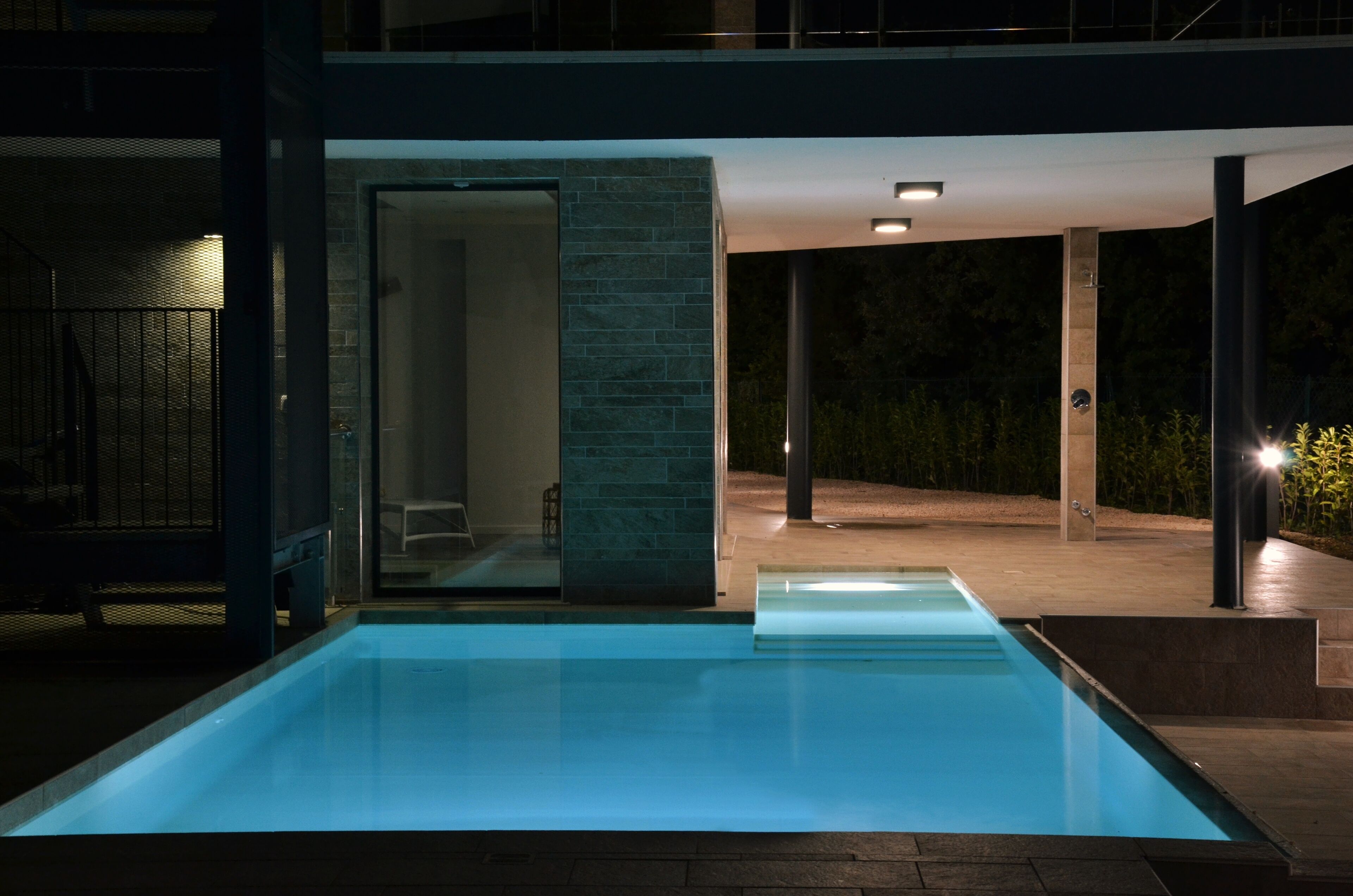 Seasonal outdoor pool, open 9:00 AM to 8:00 PM, pool umbrellas