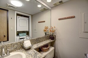 Bathtub, hair dryer, towels