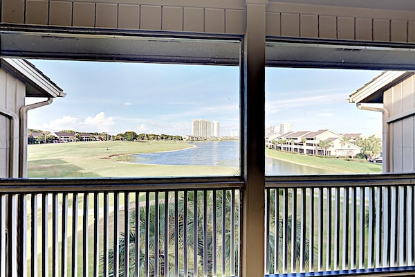 View from 2nd floor screened in balcony overlooking Stewart Lake