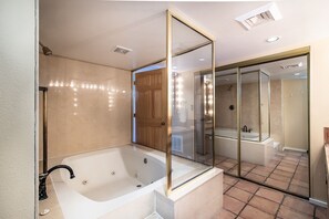 Bathtub, jetted tub, hair dryer, towels