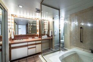 Bathtub, jetted tub, hair dryer, towels