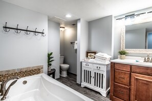 Bathtub, hair dryer, towels