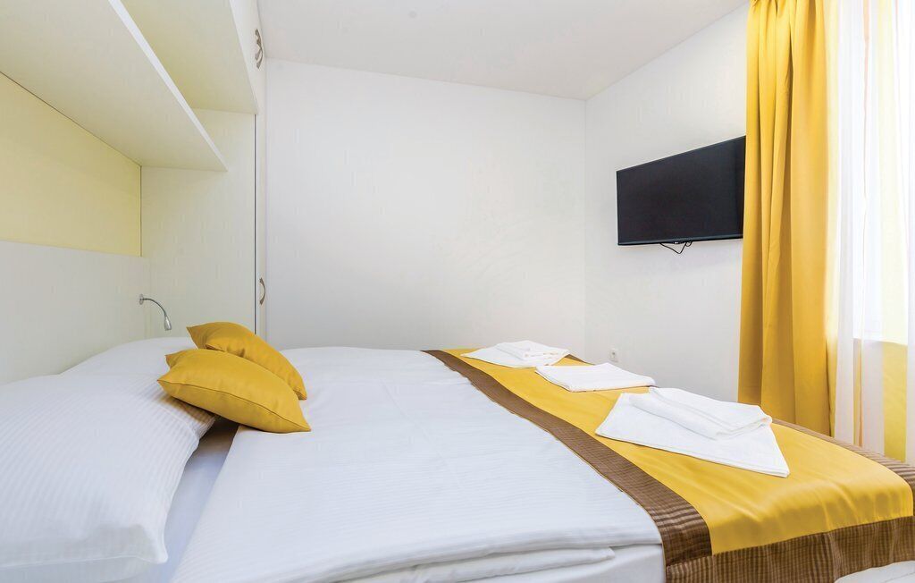 Literie de qualité supérieure, coffres-forts dans les chambres, bureau