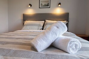 1 غرفة نوم ومكواة/لوح كي وواي فاي وملاءات أسرّة