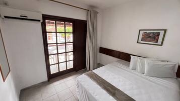 Apto Standard Casal | Frigobar, cofres nos quartos, roupa de cama