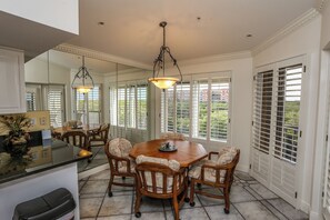 Enjoy meals in this elegant dining area with a large oval table and six comfortable chairs.