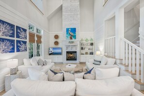 Smart TV, fireplace, books, offices