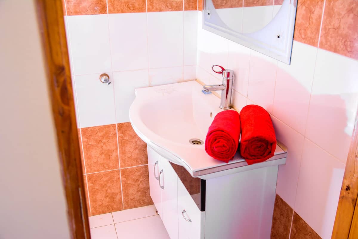 shower, rainfall showerhead, towels, soap