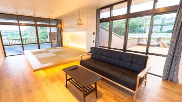 Basic-Zimmer (Private Vacation Home) | Wohnbereich | Fernseher