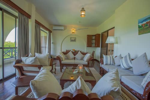 Penthouse | Living area | 43-inch Smart TV with satellite channels, TV, Netflix