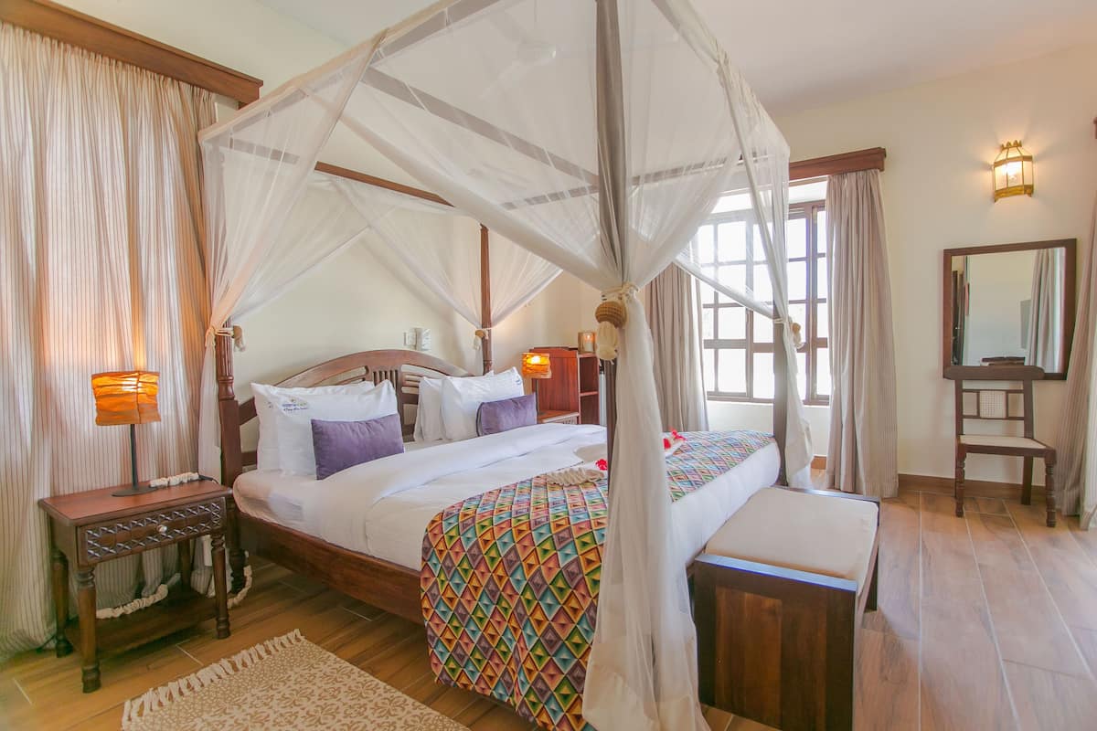 Executive Suite | 1 bedroom, down duvets, in-room safe, individually furnished