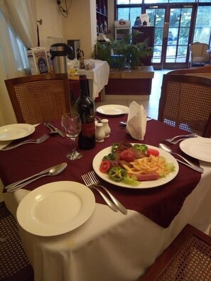 Breakfast, lunch, dinner served; local and international cuisine - Mangel Hotel and Suites (Calabar)