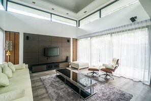 Villa Confort | Aire de séjour | Téléviseur à écran plat