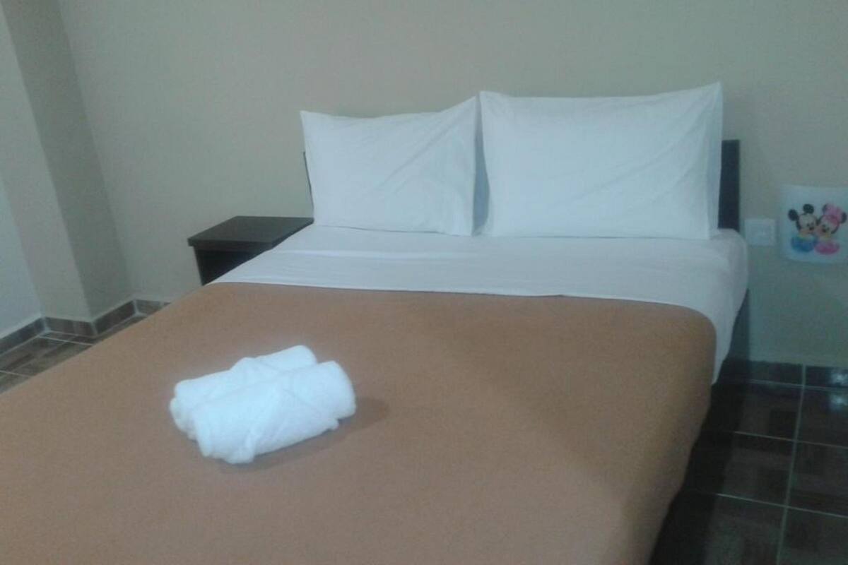 Standard Room | Iron/ironing board (on request)