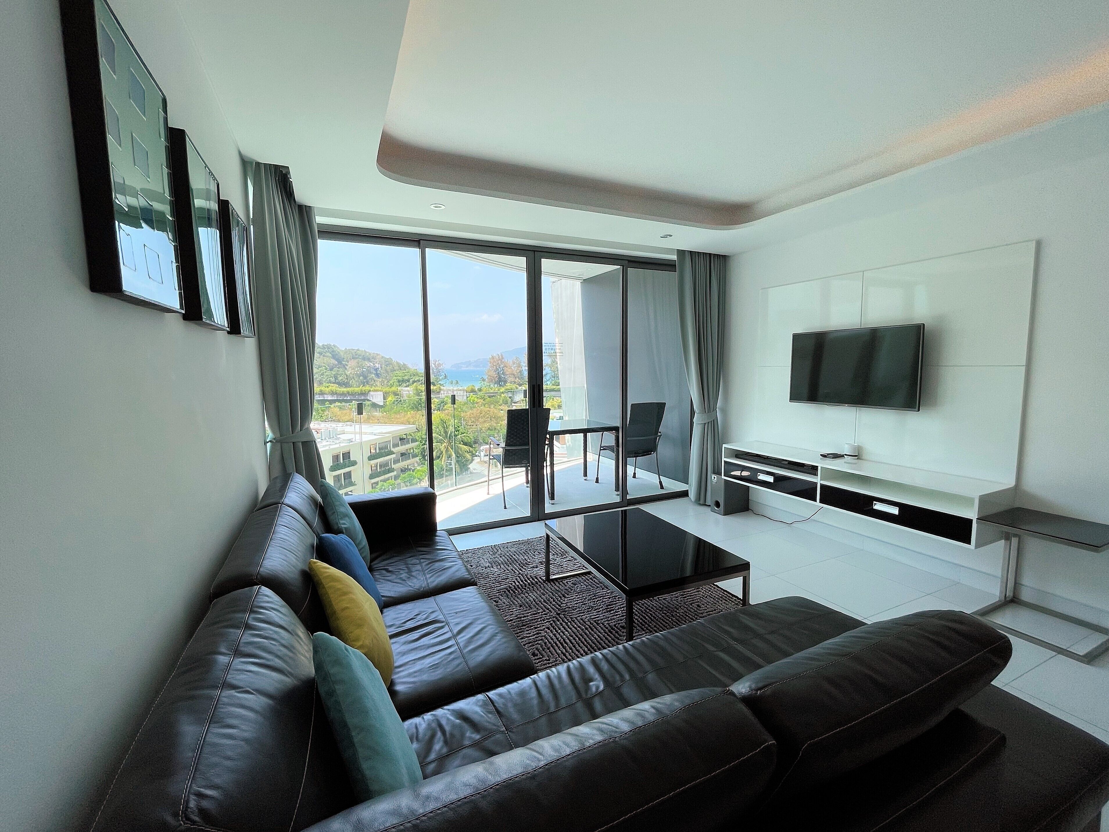 华丽公寓, 1 张特大床和 1 张沙发床, 海洋景观 | 起居区 | 42-英寸液晶电视 （配备有线频道）、电视