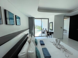 Appartement Deluxe, 1 très grand lit et 1 canapé-lit, vue océan | Coffres-forts dans les chambres, décoration personnalisée