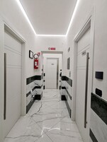 Deluxe Double or Twin Room | Minibar, in-room safe, desk, blackout drapes